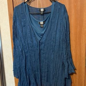 Sheer outer shirt and undershirt included.